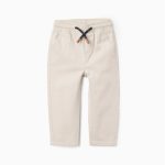 Pantalon en sergé beige à taille élastiquée et cordon de serrage pour bébé garçon