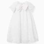 Robe blanche à nœud et manches à volants style cape pour fille