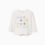 T-shirt à manches longues en coton blanc avec imprimé de cœurs pour bébé fille